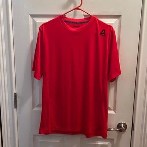 Men’s red Reebok dri fit short sleeve shirt NWOT